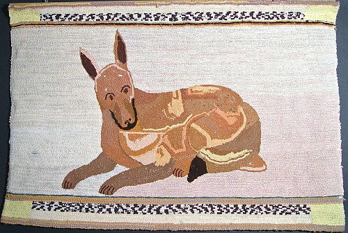 Folk Art American Folk Art Hooked Rug decorated with a Dog, 1890-1920 $700