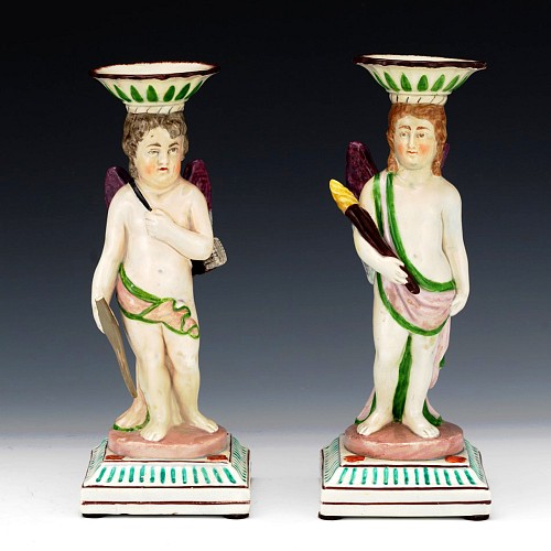 Inventory:  Pearlware, "Cupid & The Torchbearer": Pair of Neale & Co. Pearlware Figural Candlesticks, Attributed to Neale & Co., Circa 1800, $2,500